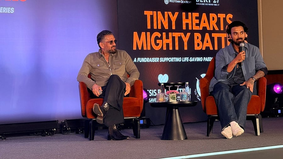 (L) Actor Suniel Shetty in conversation with cricketer KL Rahul during the 'Tiny Hearts, Mighty Battles' fundraiser in Bengaluru.
