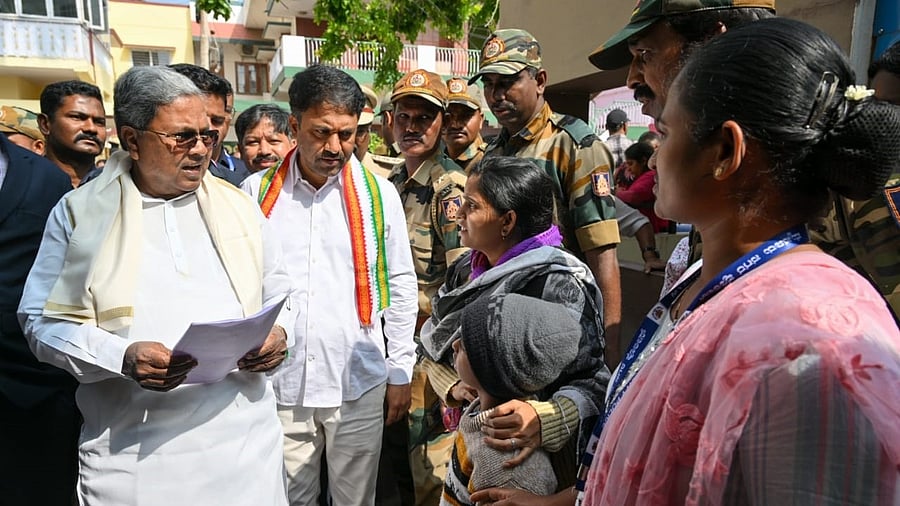 <div class="paragraphs"><p>Chief Minister Siddaramaiah hearing people's grievances and receiving petitions near his house in Mysuru on Monday. </p></div>