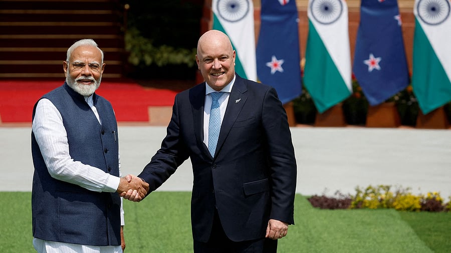 <div class="paragraphs"><p>FILE PHOTO: Prime Minister of New Zealand Christopher Luxon shakes hands with his Indian counterpart Narendra Modi.</p></div>