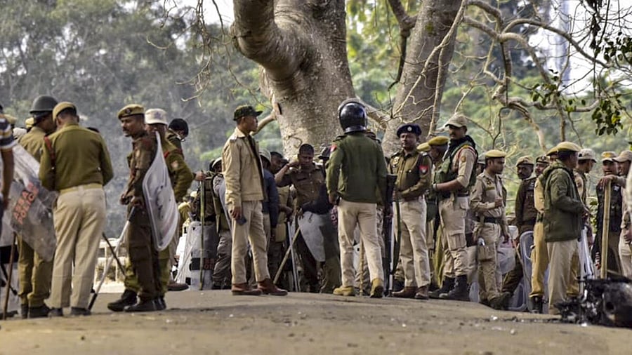 <div class="paragraphs"><p>Security personnel keep vigil following a wave of violence allegedly triggered by rumours, in West Karbi Anglong, Assam, Tuesday, Dec. 23, 2024.</p></div>