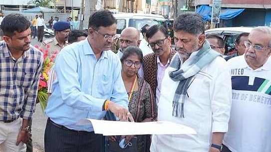 <div class="paragraphs"><p>Deputy Chief Minister DK Shivakumar during an inspection of the road being constructed in the buffer zone of a stormwater drain in Koramangala.</p></div>