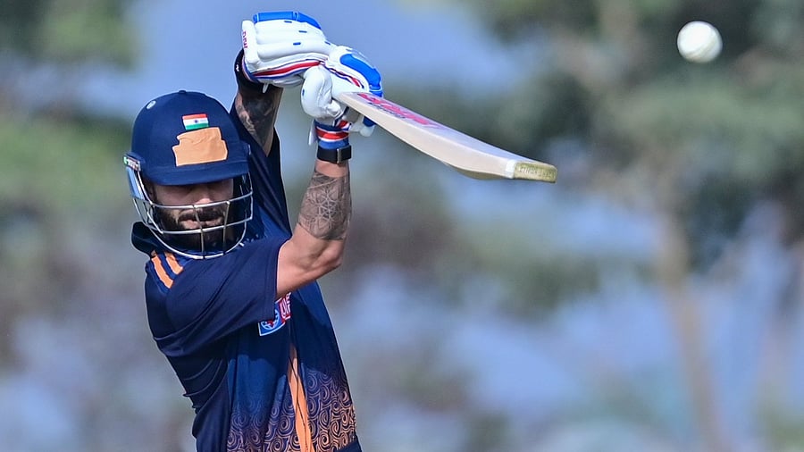 <div class="paragraphs"><p>Delhi's Virat Kohli sends one to the fence en route to his century against Andhra in their Group D Vijay Hazare Trophy match at the BCCI's Centre of Excellence Ground in Bengaluru on Wednesday. </p></div>
