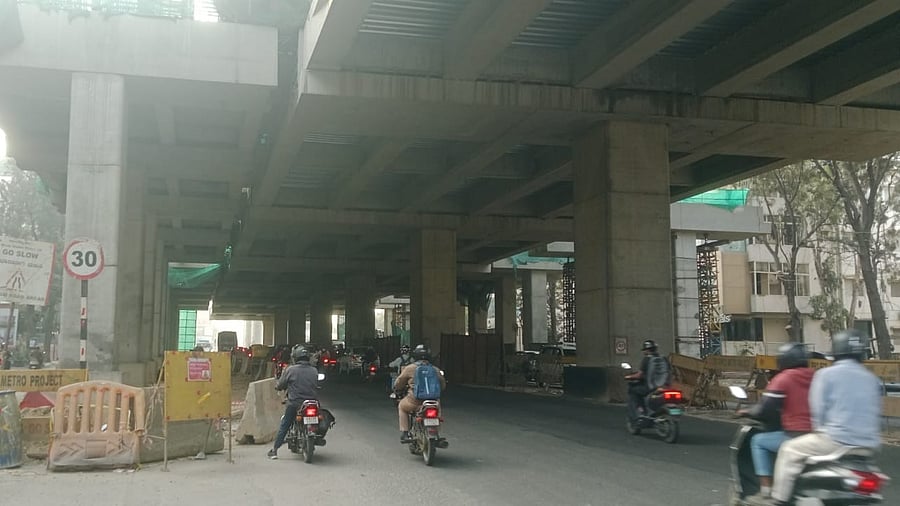 <div class="paragraphs"><p>Traffic moves slowly from Mahadevapura to Marathahalli due to ongoing metro station construction near Karthik Nagar. </p></div>