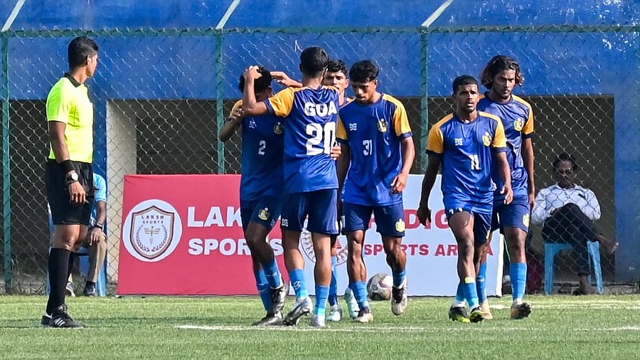 <div class="paragraphs"><p>Goa players celebrates after Stendly Fernandes scored the opening goal against Karnataka during the Santosh Trophy match at Bangalore Football Stadium on Wednesday. </p></div>