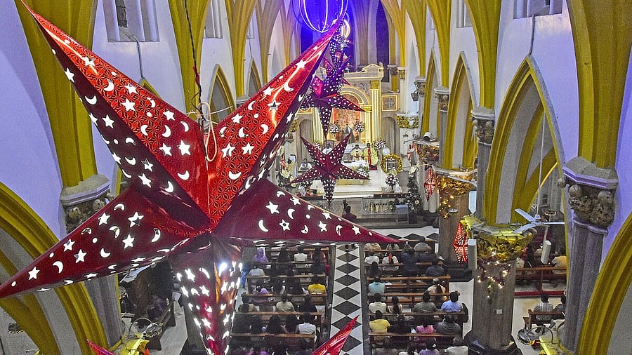 <div class="paragraphs"><p>People offer prayers at a church on the eve of the Christmas festival, in Bengaluru, Karnataka.</p></div>
