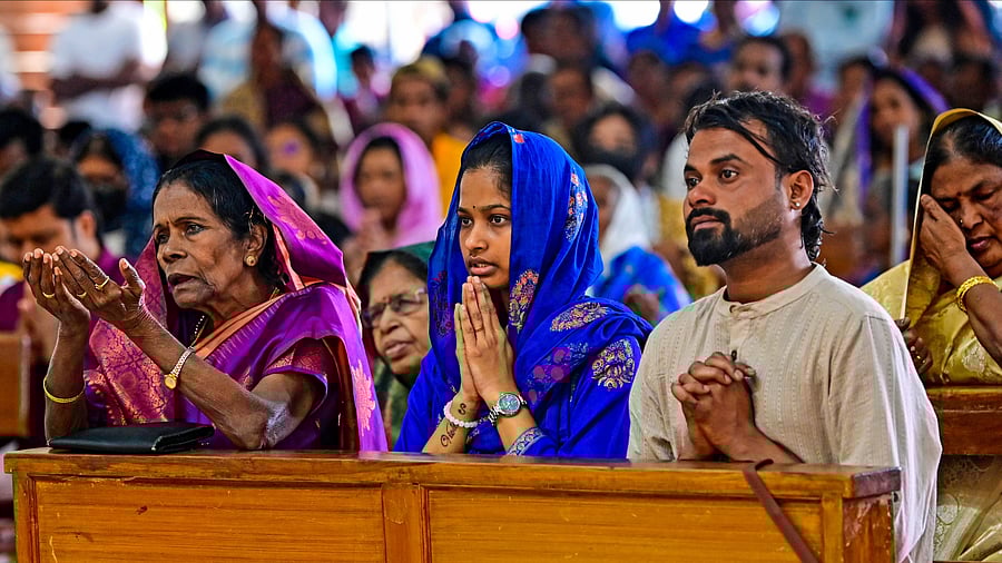 <div class="paragraphs"><p>The faithful offer prayers on the occasion of Christmas at Infant Jesus church at Viveknagar on Thursday. </p></div>