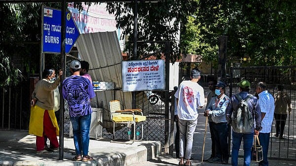 <div class="paragraphs"><p>Family members of victims wait outside Burns Ward, Victoria Hospital. </p></div>