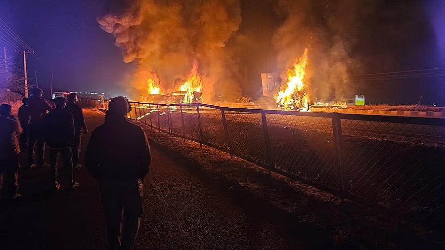 <div class="paragraphs"><p>The bus burst into flames after it was hit by a speeding truck.</p></div>