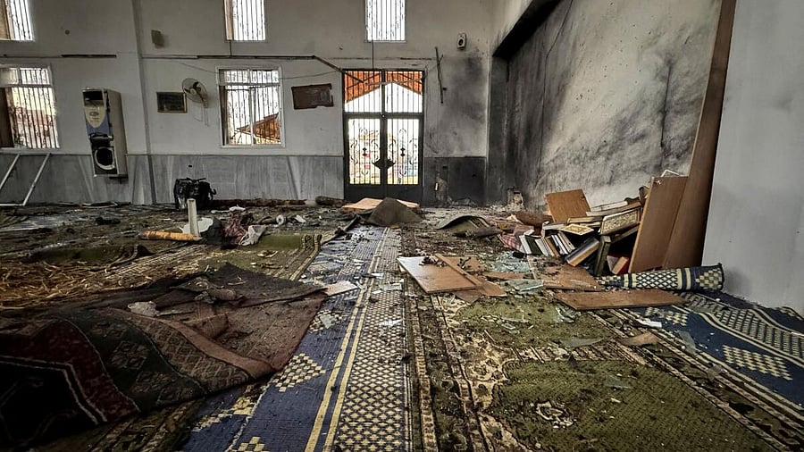 <div class="paragraphs"><p>A view shows an interior of a damaged mosque after several people were killed in an explosion at a mosque of the Alawite minority sect, as a Syrian Arab News Agency (SANA) said, in Homs, Syria December 26, 2025.</p></div>