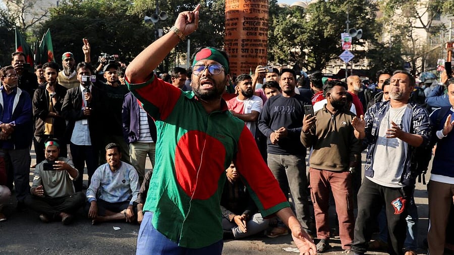<div class="paragraphs"><p>Supporters chant slogans as they block Shahbagh Square demanding justice, following the death of Sharif Osman Hadi, a student leader, who was undergoing treatment in Singapore after being shot in the head, in Dhaka, Bangladesh.</p></div>