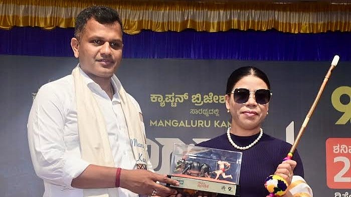 <div class="paragraphs"><p>DK MP Capt Brijesh Chowta hands over a kambala memento along with kambala stick to Indian Olympic boxer Mary Kom during the ninth edition of Mangaluru kambala at Goldfinch City, Bangrakuluru in Mangaluru on Saturday.  </p></div>