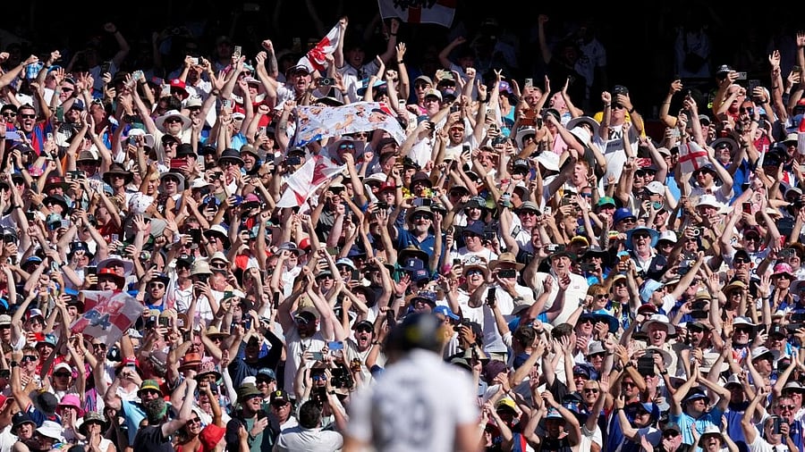 <div class="paragraphs"><p>England fans celebrate after the match.</p></div>