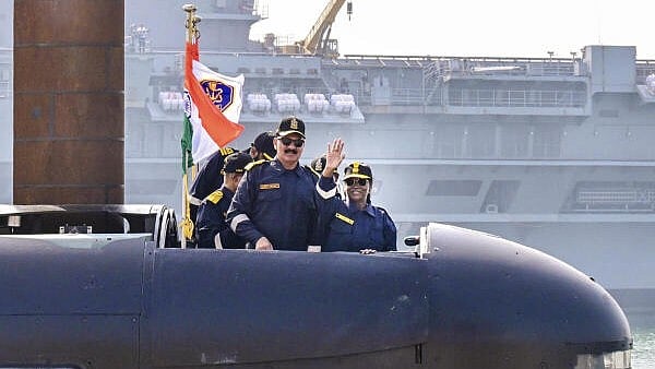 <div class="paragraphs"><p>President Droupadi Murmu with Chief of the Naval Staff Admiral Dinesh K. Tripathi during a sortie on the Navy's indigenous Kalvari class submarine INS Vaghsheer at Karwar Naval Base, Karnataka.</p></div>