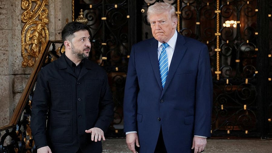 <div class="paragraphs"><p>Ukrainian President Volodymyr Zelenskiy looks at US President Donald Trump as Trump reacts to questions from the media upon Zelenskiy's arrival for meetings at Trump's Mar-a-Lago club in Palm Beach, Florida.</p></div>