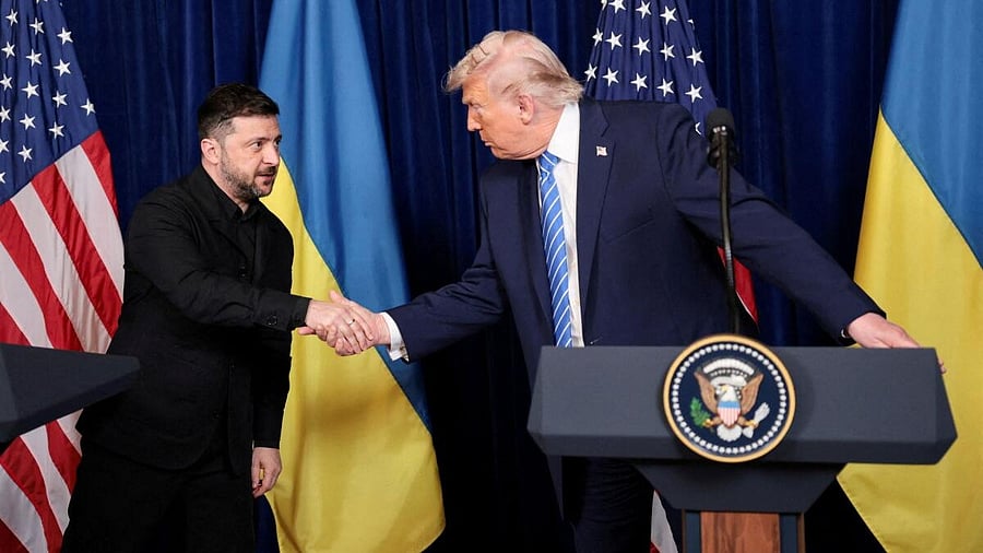 <div class="paragraphs"><p>US President Donald Trump and Ukrainian President Volodymyr Zelenskiy shake hands during a press conference after their lunch meeting at Trump’s Mar-a-Lago club, in Palm Beach, Florida, US..</p></div>