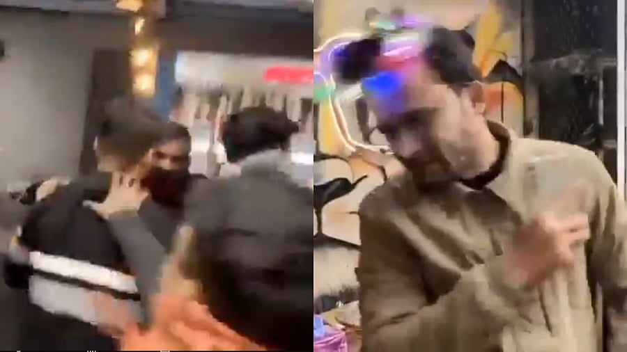 <div class="paragraphs"><p>Screengrabs from the video that showed the people assaulting the two men in the cafe.</p></div>