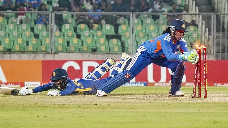 <div class="paragraphs"><p>India's wicketkeeper Richa Ghosh dislodges the bails for a runout attempt during the fourth T20 International cricket match of a series between India Women and Sri Lanka Women, at Greenfield International Stadium, in Thiruvananthapuram, Kerala.</p></div>