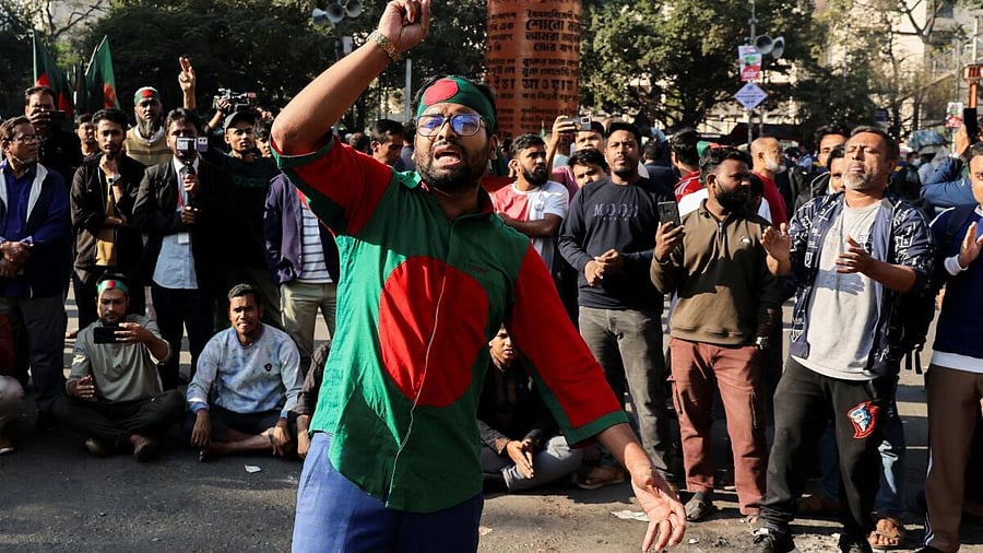 <div class="paragraphs"><p>Supporters chant slogans as they block Shahbagh Square demanding justice, following the death of Sharif Osman Hadi, a student leader, who was undergoing treatment in Singapore after being shot in the head, in Dhaka, Bangladesh, December 19, 2025.</p></div>