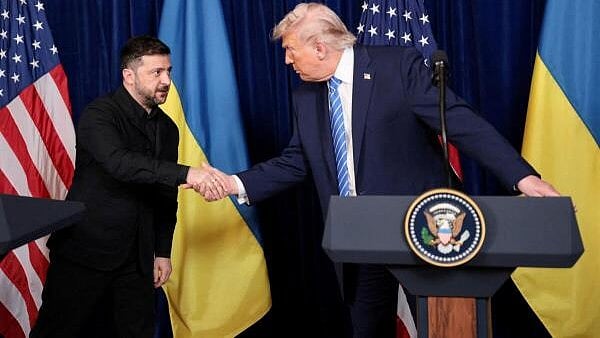<div class="paragraphs"><p>U.S. President Donald Trump and Ukrainian President Volodymyr Zelenskiy shake hands during a press conference after their lunch meeting at Trump’s Mar-a-Lago club, in Palm Beach, Florida, U.S., December 28, 2025.</p></div>