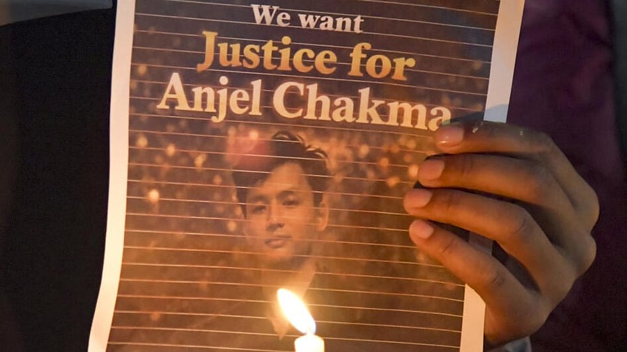 <div class="paragraphs"><p>Members of students' organisations and locals participate in a candlelight march at Gandhi Park protesting the assault and death of Tripura student Angel Chakma, in Dehradun, Monday, Dec. 29, 2025</p></div>