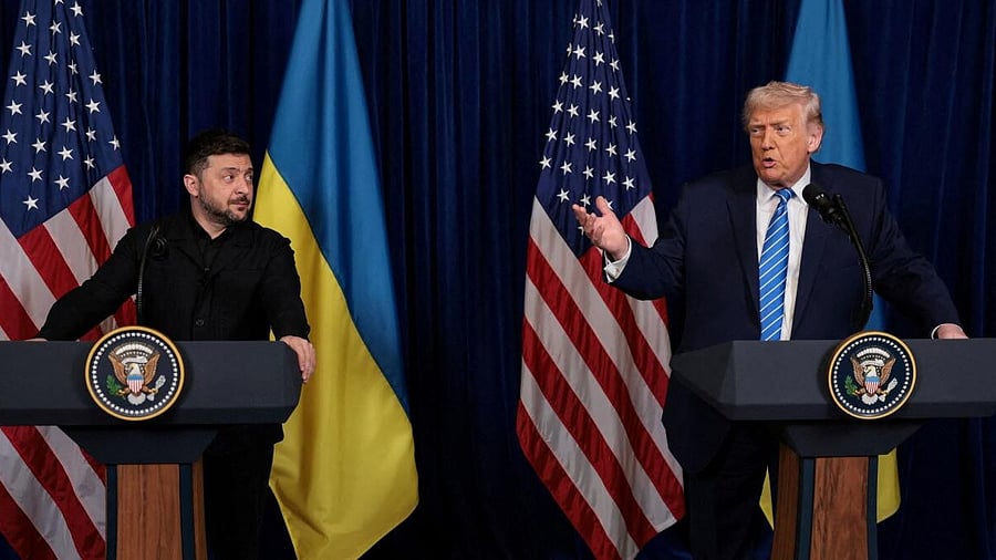 <div class="paragraphs"><p>Ukrainian President Volodymyr Zelenskiy listens to U.S. President Donald Trump, after Trump said that Russian President Vladimir Putin expressed willingness to help Ukraine "succeed", during a press conference at Trump's Mar-a-Lago club, in Palm Beach, Florida, U.S., December 28, 2025.</p></div>