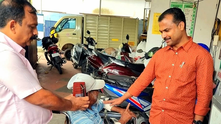 <div class="paragraphs"><p>CPI(M) MLA V K Prasanth interacts with a differently-abled person at his office. </p></div>