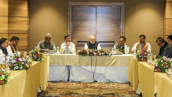 <div class="paragraphs"><p>Union Home Minister Amit Shah during a meeting with BJP West Bengal leaders, in Kolkata.</p></div>