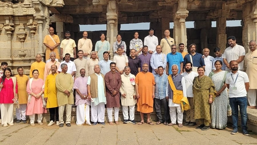 The Rashtriya Swayamsevak Sangh pracharaks from 23 countries, along with Sarkaryavah Dattatreya Hosabale, visit the Vijaya Vittala temple complex in Hampi on Wednesday. 