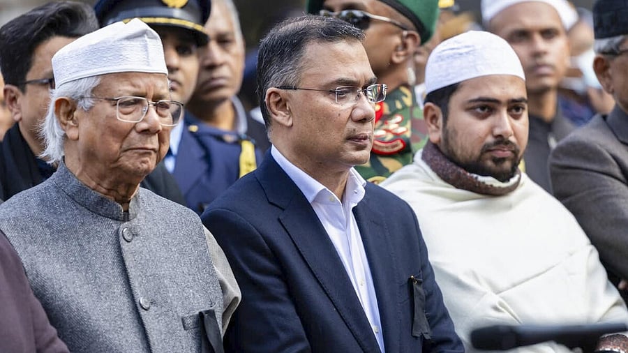 <div class="paragraphs"><p>In this image posted on Dec. 31, 2025, Bangladesh Chief Adviser Professor Muhammad Yunus and BNP Acting Chairman Tarique Rahman with others during the funeral prayers of the latter’s mother and the country’s former prime minister Khaleda Zia, in Dhaka.</p></div>