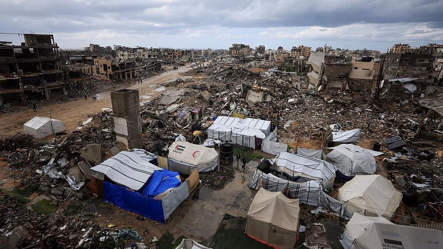 <div class="paragraphs"><p>Displacement tents next to destroyed buildings after Israeli military operations using armoured personnel carriers and explosive devices, in Gaza City.</p></div>