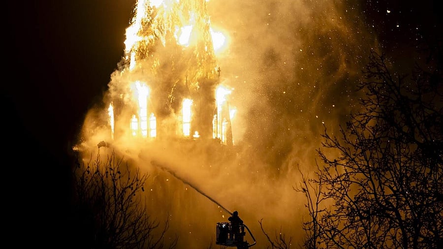 <div class="paragraphs"><p>The Amsterdam police ‍and fire department said they were investigating and had no comment yet on what caused the blaze in the church, which was built in 1872.</p></div>