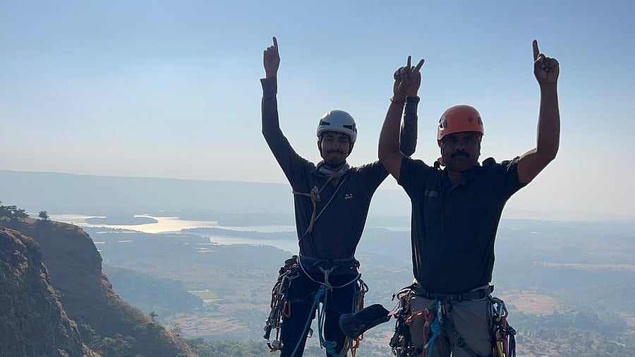 <div class="paragraphs"><p>Rock climbers after successful climb.</p></div>