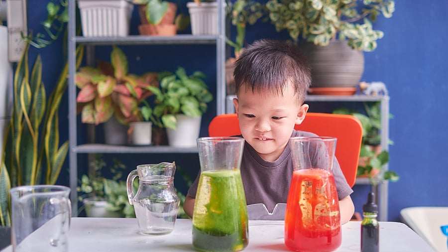 A child attempting the lava lamp experiment. Credit: iStock