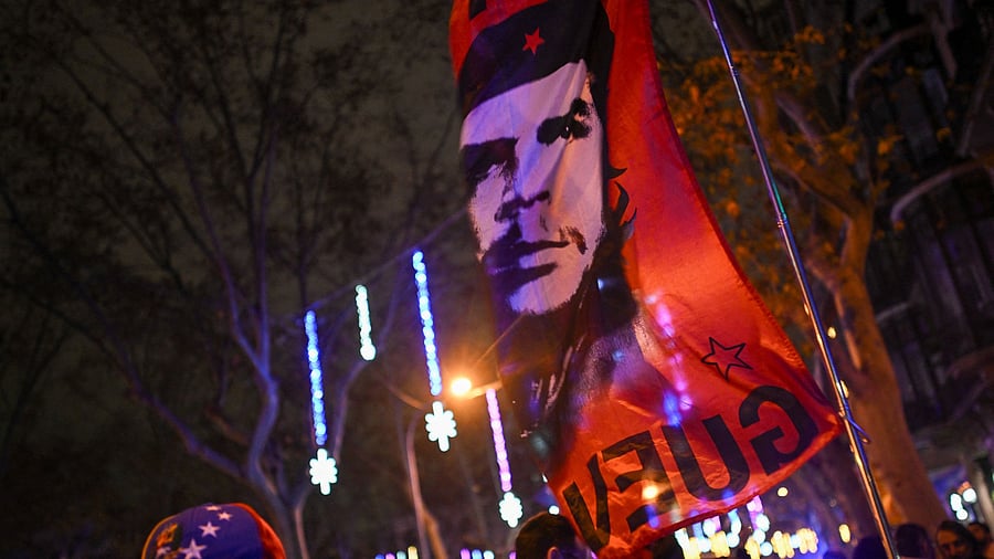 <div class="paragraphs"><p>People react to the news of U.S. strikes on Venezuela and capture of President Maduro, in Barcelona</p><p></p></div>