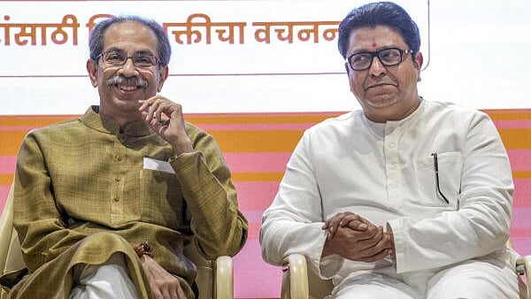 <div class="paragraphs"><p>Shiv Sena (UBT) chief Uddhav Thackeray, left, and Maharashtra Navnirman Sena (MNS) chief Raj Thackeray during a press conference regarding the release of their alliance manifesto for the upcoming civic polls, at Sena Bhavan, in Mumbai.</p></div>