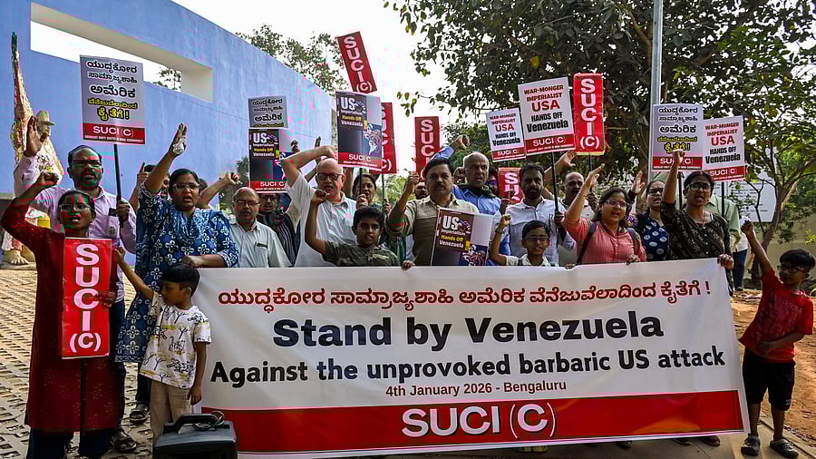 <div class="paragraphs"><p>Members of the Socialist Unity Centre of India (Communist) protest against US military strikes in Venezuela, at Freedom Park in Bengaluru on Sunday. </p></div>