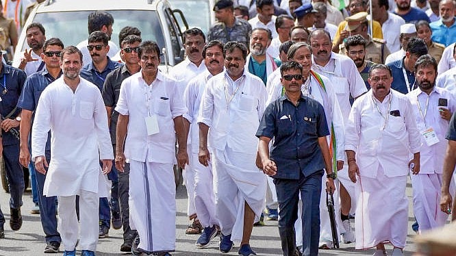 <div class="paragraphs"><p>Congress leaders Rahul Gandhi, KC Venugopal, Shashi Tharoor and other party workers during the Bharat Jodo Yatra, in Thiruvananthapuram.</p></div>