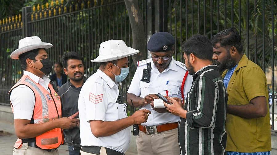 <div class="paragraphs"><p>Traffic police fine motorists for rule violations during a special drive. </p></div>