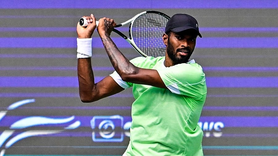 <div class="paragraphs"><p>Dhakshineswar Suresh returns during his straight-set victory over Croatia's Duje Ajdukovic in the opening round of the Bengaluru Open on Tuesday. </p></div>