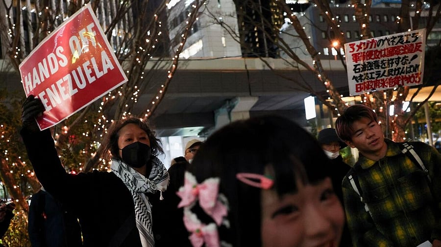 <div class="paragraphs"><p>Activists attend a rally to condemn the U.S. conducting a military operation on Venezuela to capture Nicolas Maduro and his wife Cilia Flores, near the U.S. embassy in Tokyo, Japan,</p></div>