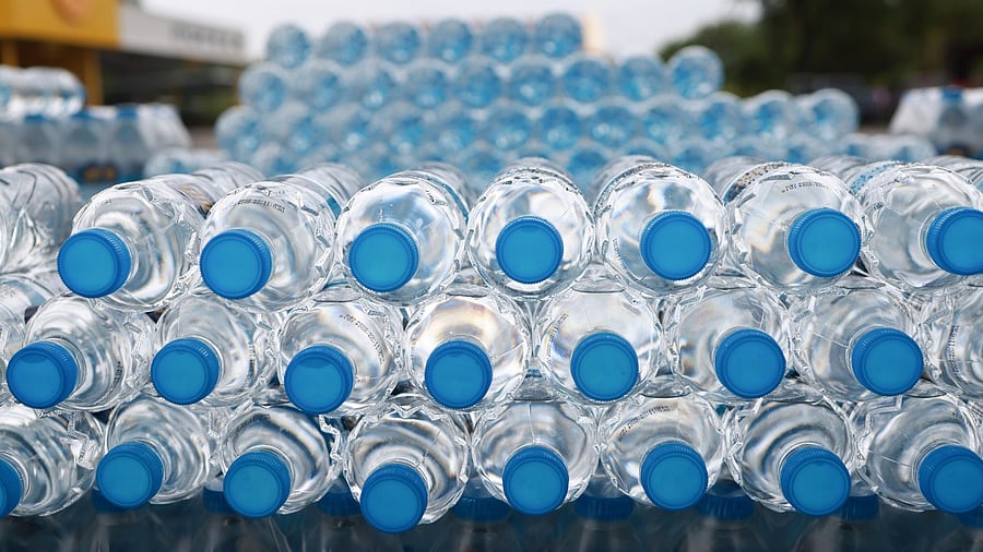 <div class="paragraphs"><p>Stack of drinking water bottles</p></div>