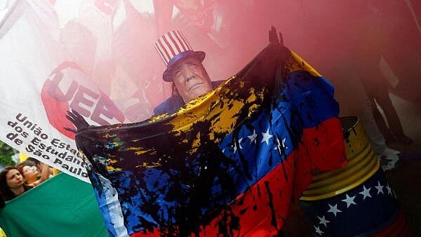 <div class="paragraphs"><p>A man wears a mask depicting U.S. President Donald Trump during a protest against U.S. strikes on Venezuela and the capture of its President Nicolas Maduro, in Sao Paulo, Brazil January 5, 2026.</p></div>