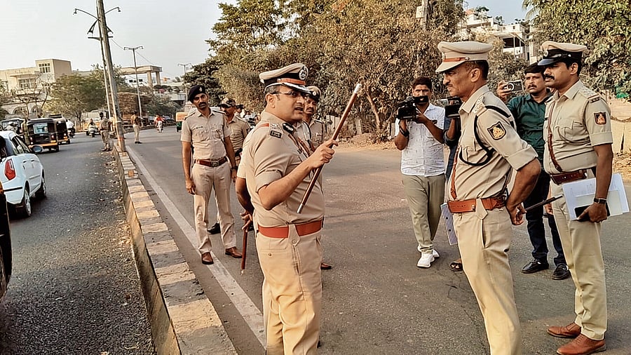IGP P S Harsha visits the incident site and discusses with officials after assuming charge in Ballari on Wednesday. dh photo