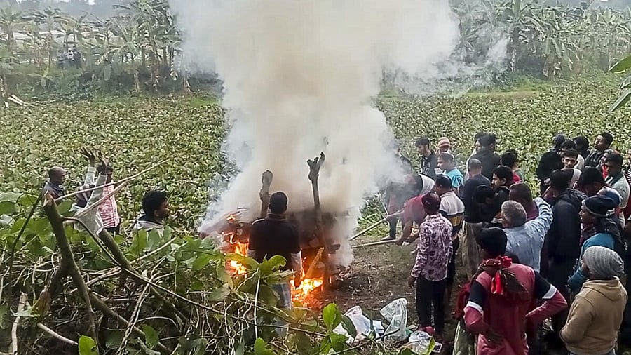 <div class="paragraphs"><p>People gather at the funeral procession of Moni Chakraborty, a 40-year-old grocery shop owner who was murdered by unidentified attackers, in Narsingdi, Bangladesh, Tuesday, Jan. 6, 2026.</p></div>