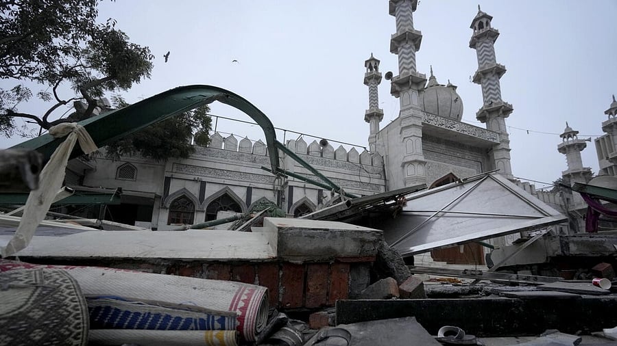 <div class="paragraphs"><p>Debris and belongings lie outside the Syed Faiz Elahi mosque after the demolition of alleged encroachments from a land adjoining the mosque carried out by the Municipal Corporation of Delhi (MCD), at Turkman Gate area, in New Delhi.</p></div>