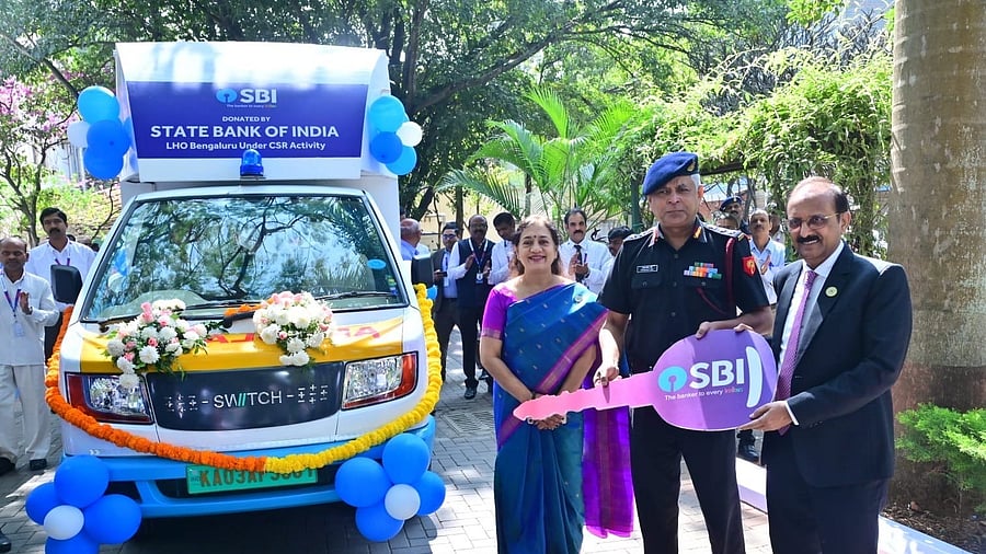 SBI Chairman Challa Sreenivasulu Setty hands over an e-ambulance to the MEG &amp; Centre in Bengaluru on Wednesday. Bengaluru Circle Chief General Manager Joohi Smita Sinha is also seen.