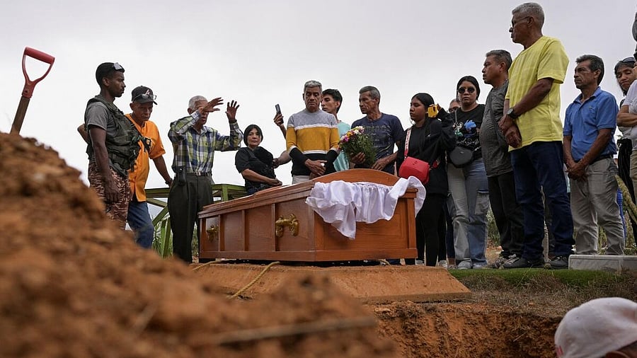 <div class="paragraphs"><p>Family members attend the funeral of Rosa Elena Gonzalez, who died from injuries sustained during US strikes in Venezuela, in Catia La Mar, on the outskirts of Caracas, Venezuela.</p></div>