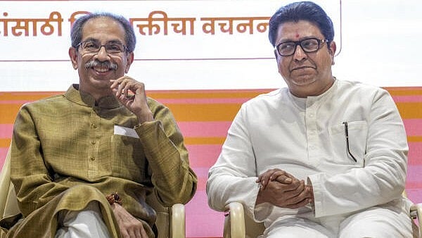 <div class="paragraphs"><p>Shiv Sena (UBT) chief Uddhav Thackeray, left, and Maharashtra Navnirman Sena (MNS) chief Raj Thackeray during a press conference regarding the release of their alliance manifesto for the upcoming civic polls, at Sena Bhavan, in Mumbai.</p></div>