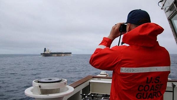 <div class="paragraphs"><p>US Coast Guard member observing the tanker.&nbsp;</p></div>