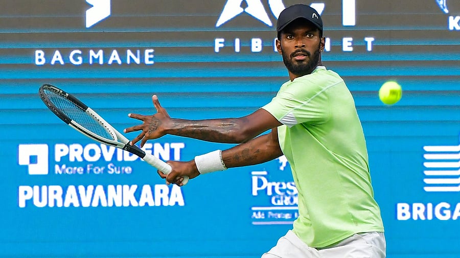 <div class="paragraphs"><p>Dhakhineswar Suresh prepares to return during his quarterfinal defeat to France’s Harold Mayot at the Bengaluru Open on Thursday. </p></div>